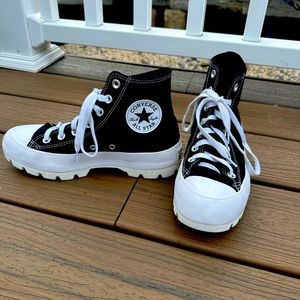 Converse Chuck Taylor Lugged high top shoes. Women’s size 7.